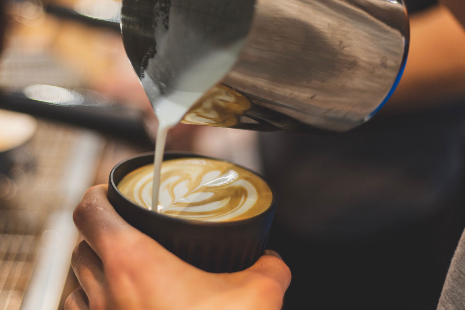 Barista Pouring a Latte